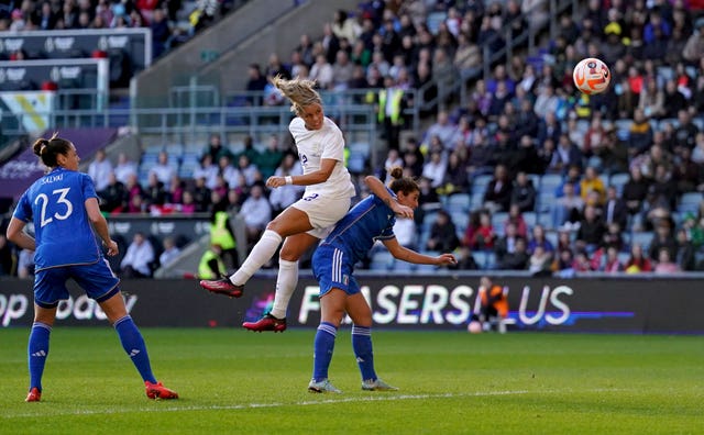 Rachel Daly heads home England's opening goal 