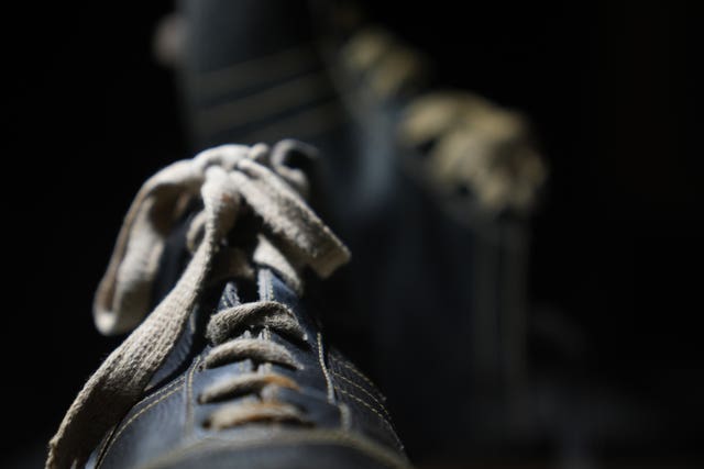 Detail of football boots worn by Jose Leandro Andrade, on display at the Paris 1924: Sport, Art and the Body exhibition