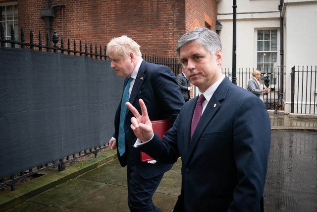 Prime Minister Boris Johnson leaves 10 Downing Street, London, with Ambassador of Ukraine to the UK Vadym Prystaiko, to attend Prime Minister’s Questions (Stefan Rousseau/PA)