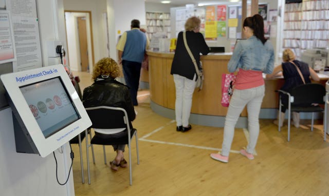 Stock image of patients in a waiting room