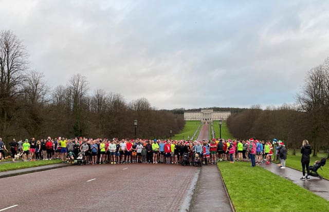 Runners on the start line at the Christmas Day Parkrun on the Stormont Estate in Belfast