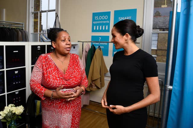 The Duchess of Sussex picks out clothes with Patsy Wardally (Clodagh Kilcoyne/PA)