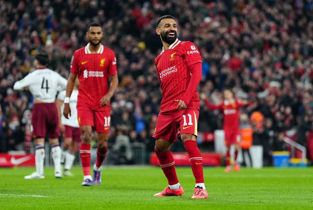 Mohamed Salah celebrates Liverpool''s third goal of the evening