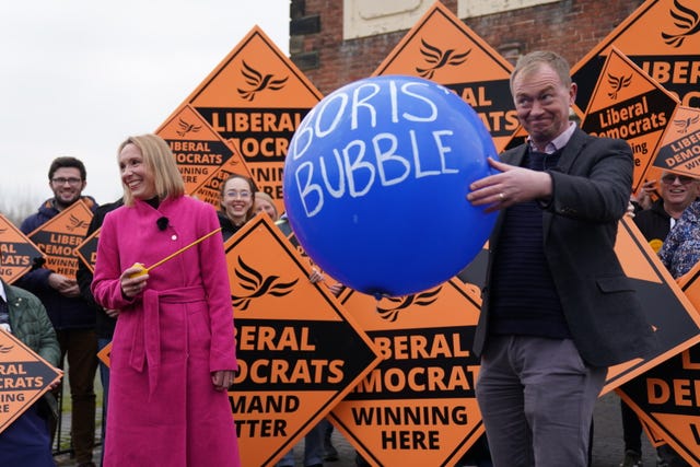 Helen Morgan bursting 'Boris’ bubble' held by colleague Tim Farron