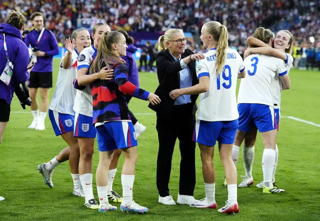 England manager Sarina Wiegman (centre right) with Aggie Beever-Jones after winning the UEFA Women’s Euro 2025 final at St. Jakob-Park in Basel, Switzerland.