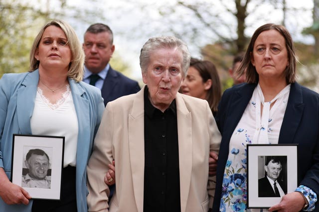  Supporters of the family of GAA official Sean Brown, with widow Bridie Brown (centre), daughter Clare Loughran (left) and daughter Siobhan Brown (right)