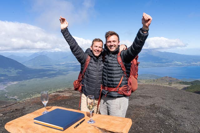 Scott Mills, left, with his husband Sam Vaughan after the pair won the BBC’s Celebrity Race Across The World