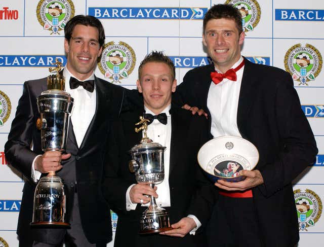 Ruud van Nistelrooy (left) with the Professional Footballers Association Player of the Year trophy