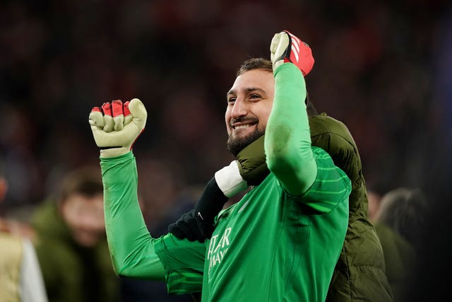 Paris St Germain keeper Gianluigi Donnarumma celebrates after winning the penalty shoot-out against Liverpool