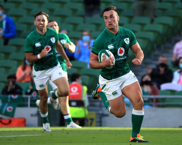 Ireland's Ronan Kelleher carries the ball for a try