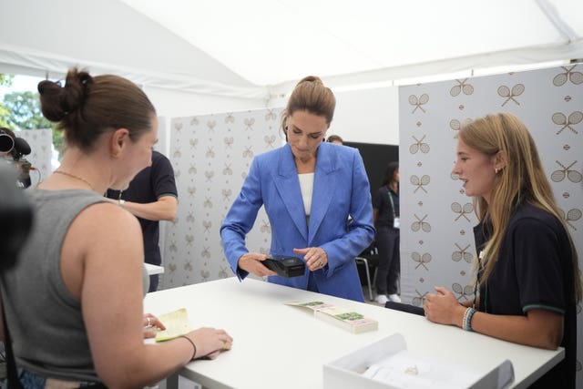 The Princess of Wales helped out in the ticket office at the start of the day 