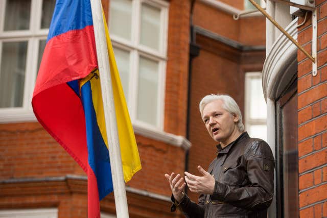 Julian Assange speaks from the balcony of the Ecuadorian embassy (Dominic Lipinski/PA)