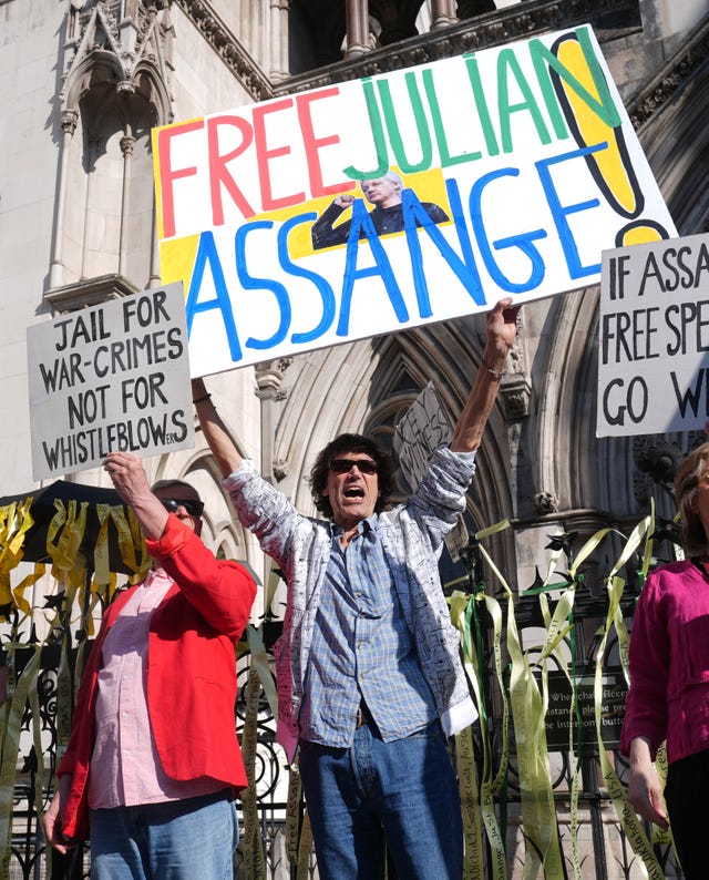 Supporters of Julian Assange outside the Royal Courts of Justice in London on Monday (Lucy North/PA)