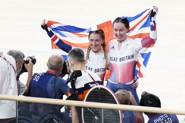 Kenny and Katie Archibald celebrate winning gold in the women's Madison final 