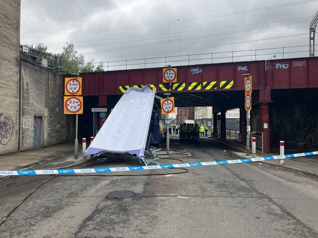 Bus hits bridge in Glasgow