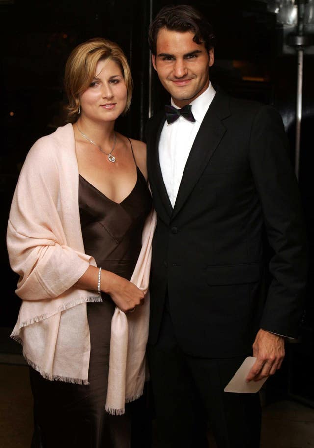 Federer with then girlfriend, now wife, Mirka Vavrinec at the 2005 Wimbledon champions' dinner