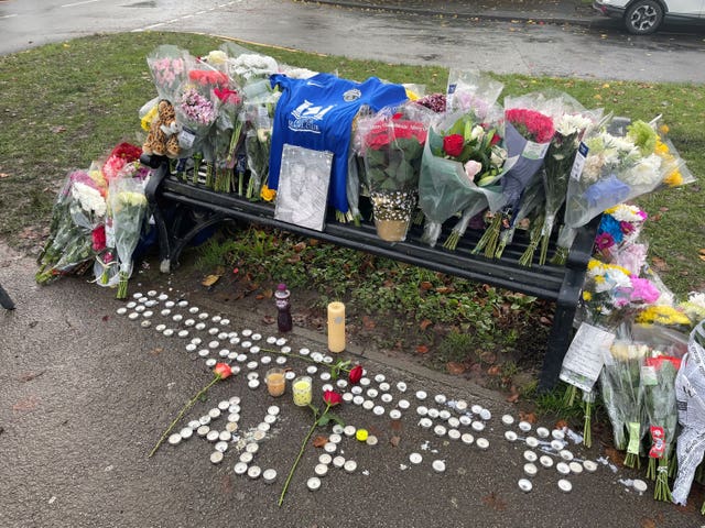 Tributes left on a bench on Broadgate Lane, Horsforth