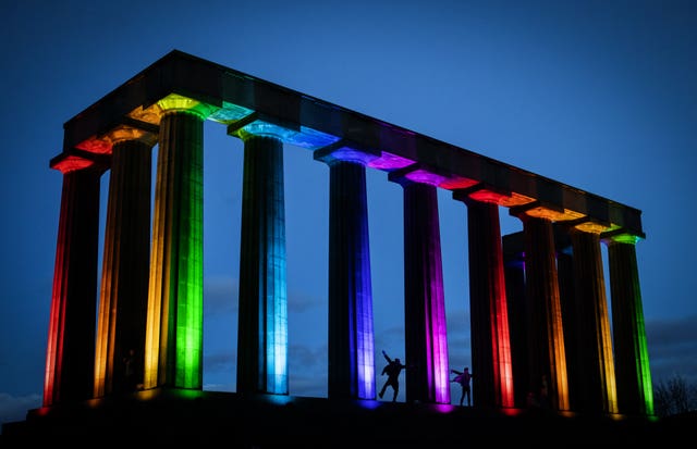 A rainbow lights up the National Monument on Calton Hill