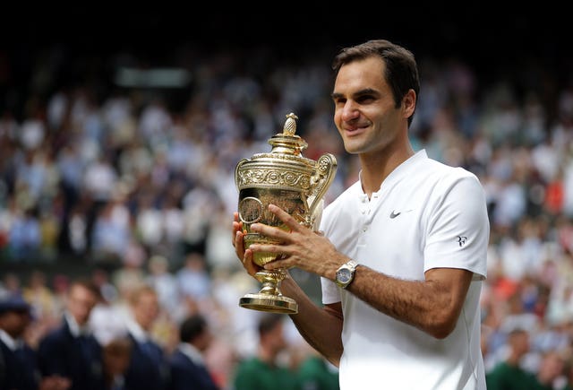 Roger Federer with the Wimbledon trophy