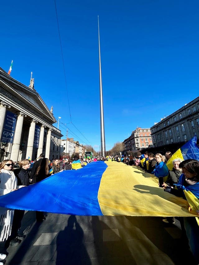 People gather outside the GPO building in O’Connell Street, Dublin, to take part in a demonstration to mark the two year anniversary of the Russian invasion of Ukraine. 