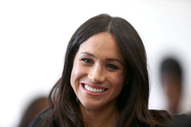 Ms Markle looked at ease as she joined her fiancee at the Commonwealth Youth Forum (Yui Mok/PA)