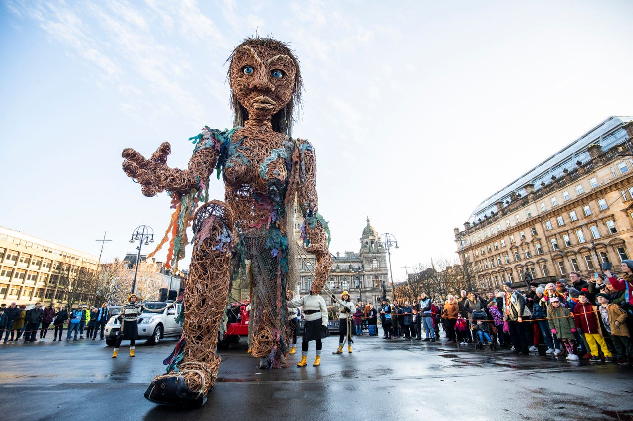 More than 10,000 watch 10metre high puppet parade through Glasgow