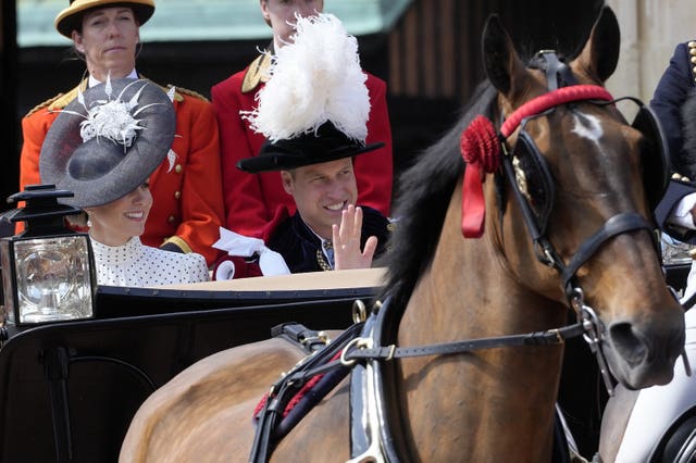 The Prince and Princess of Wales depart in a carriage  (Kirsty Wigglesworth/PA)