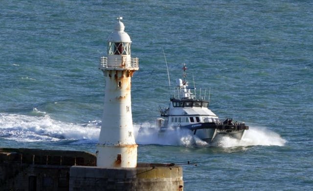 A group of people thought to be migrants are brought in to Dover, Kent, onboard a Border Force vessel (Gareth Fuller/PA)