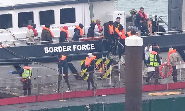 People thought to be migrants disembark Border Force vessel