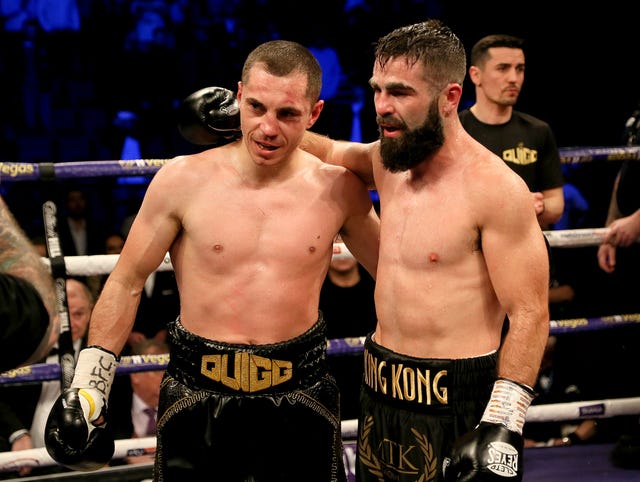 Former world super-bantamweight champion Scott Quigg's hopes of claiming the super-featherweight title were dealt a blow when he was beaten by  Jono Carroll (right) at Manchester Arena