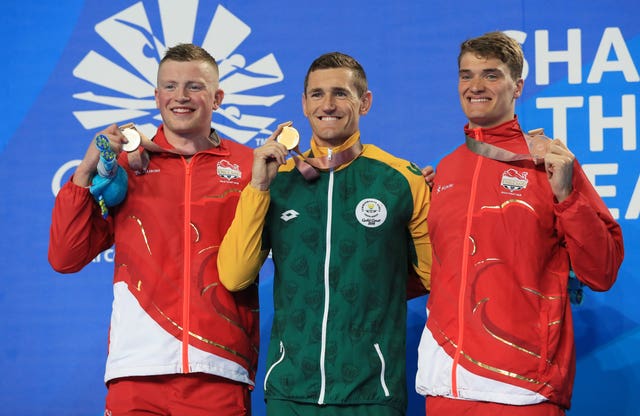 Adam Peaty, left, had to settle for 50m breaststroke silver behind South Africa's Cameron van der Burgh as James Wilby took bronze