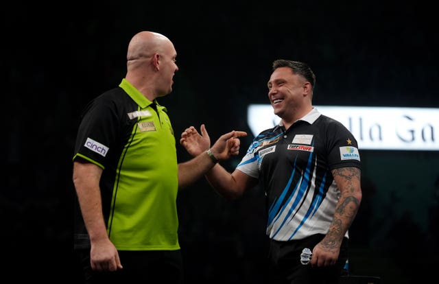 Michael van Gerwen, left, on stage with Gerwyn Price 