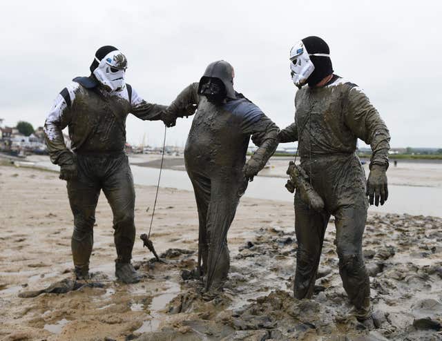 Competitors dressed as Darth Vader and two Storm Troopers