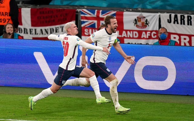 England's Harry Kane celebrates scoring against Denmark in the Euro 2020 semi-final at Wembley