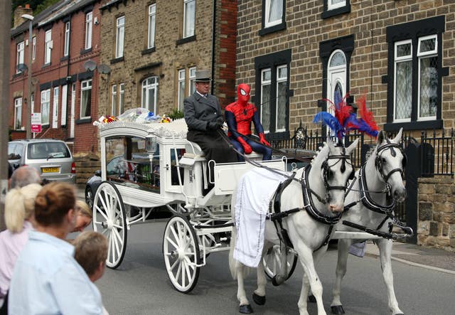 The coffin of seven year old Conley Thompson arriving at St Thomas and St James Church in Worsbrough Dale for his funeral