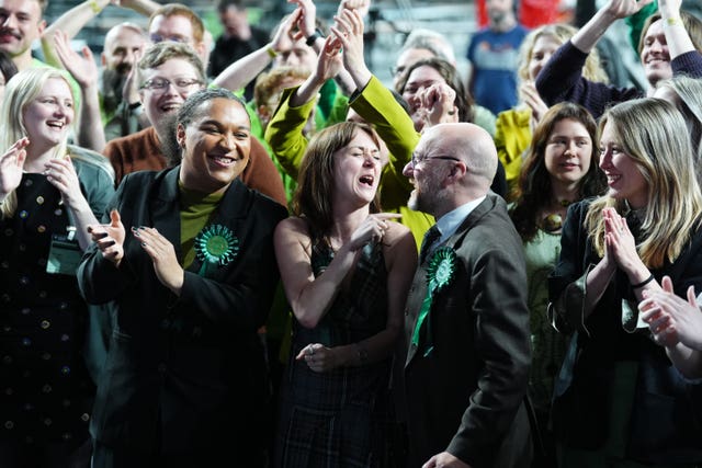 Green Party members cheering