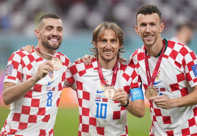 Croatia’s Mateo Kovacic, Luka Modric and Ivan Perisic, left to right