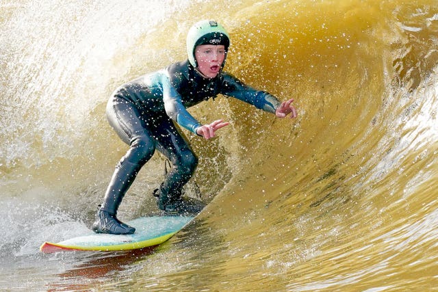 A surfer riding a wave