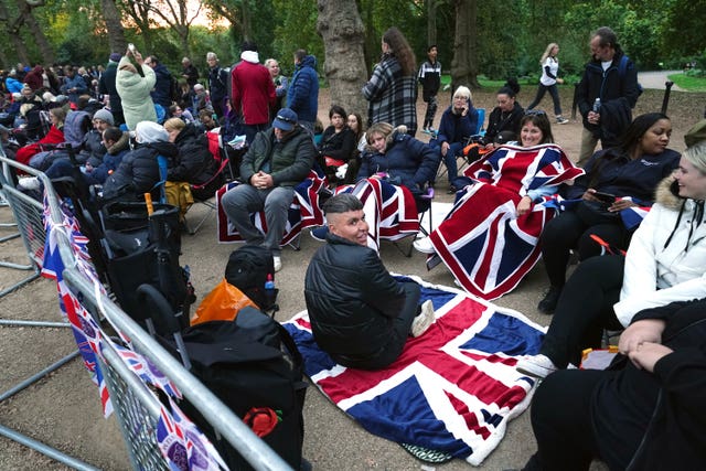Members of the public in The Mall, central London, before the Queen's state funeral