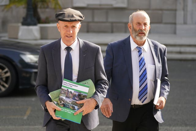 Michael Healy-Rae and Danny Healy-Rae walk together