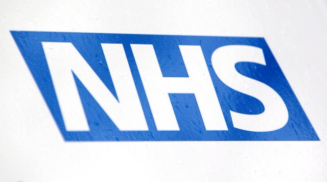 An NHS sign (Yui Mok/PA)