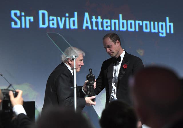 The Duke of Cambridge presents an award to Sir David Attenborough 
