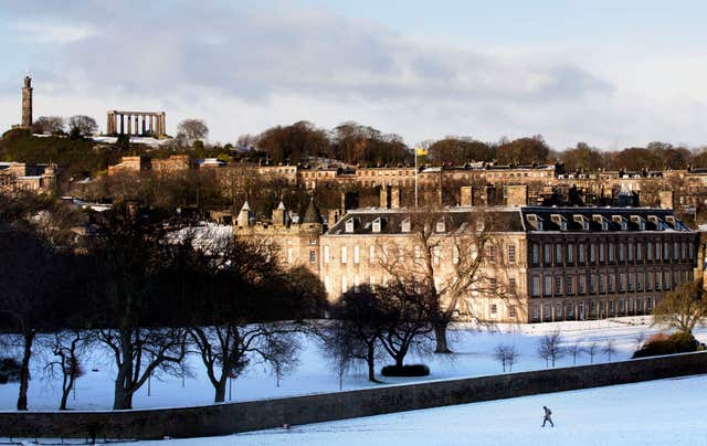 Snow blankets the grounds of the Palace of Holyroodhouse, the Queen’s official residence in Edinburgh (David Cheskin/PA)