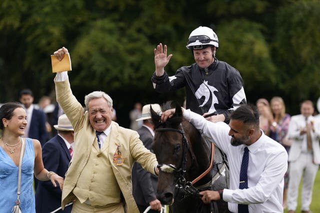 Pat Cosgrave celebrates after winning the Stewards' Cup on Get It 