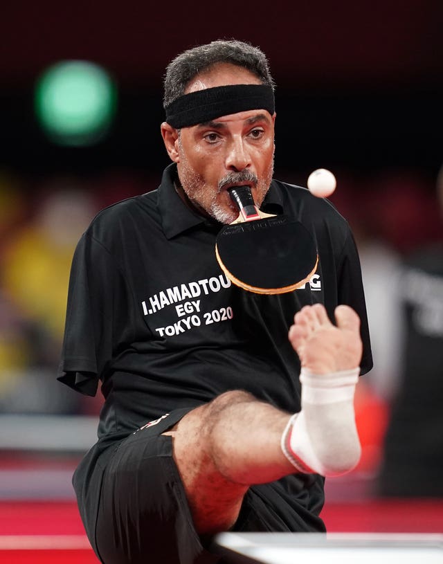 Egypt's Ibrahim Elhusseiny Hamadtou competes in the men's singles class 6 Group E Table Tennis event at the Paralympics in Tokyp. The 48-year-old lost both of his arms in a train accident when he was 10