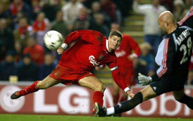 Fabien Barthez, playing for Marseille, saves from Liverpool's Steven Gerrard