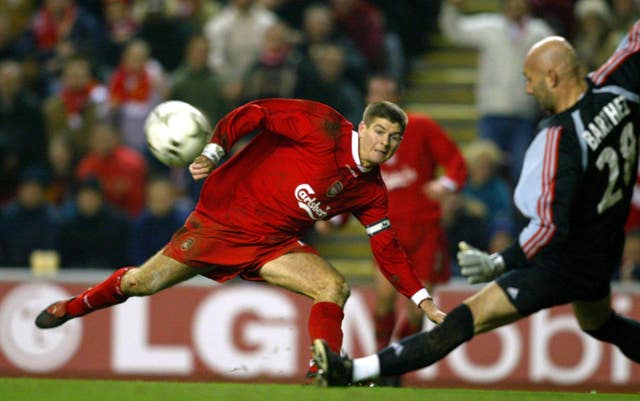 Fabien Barthez, playing for Marseille, saves from Liverpool's Steven Gerrard