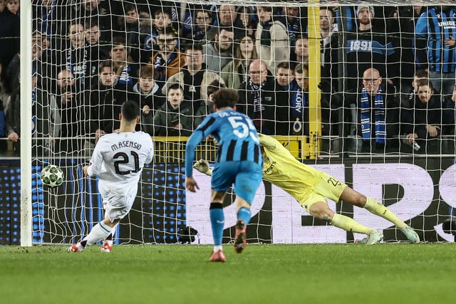 Marco Asensio scores his penalty into the left corner