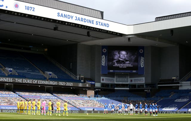 Rangers and Hibernian players observe a two minute silence at Ibrox