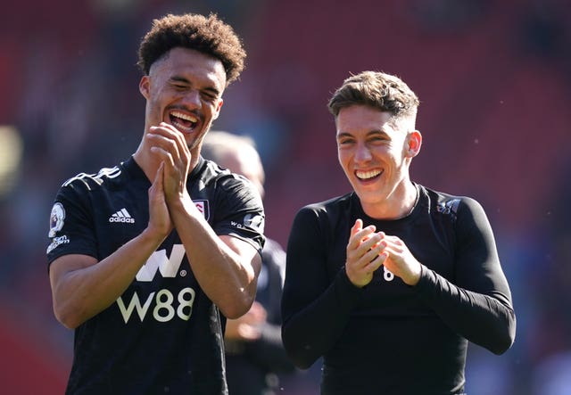 Fulham's Harry Wilson, right, and Antonee Robinson celebrate victory over Southampton
